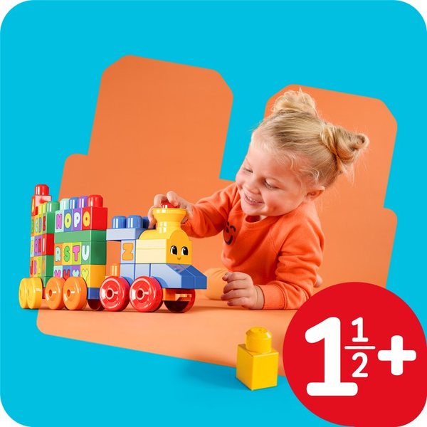 Child playing with a MEGA BLOKS set labelled 1½+